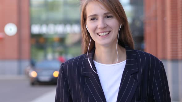 Video Chat Outside Office, Discussing Businesswoman