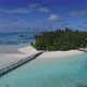 Aerial view of luxury Maldives island with white sand and over water villas and palm trees - VideoHive Item for Sale
