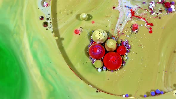 Colorful Ink Spheres On Oil  alt