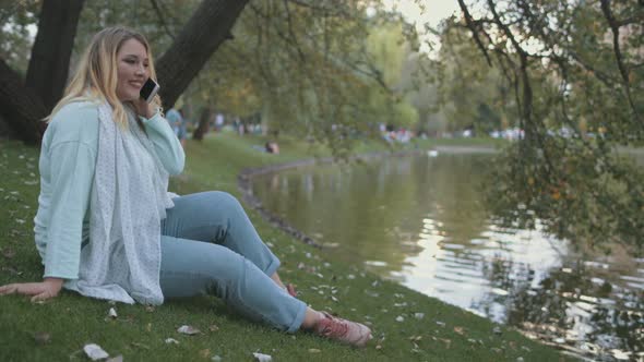 Woman Plus Size Talk Smartphone Sit On River Bank