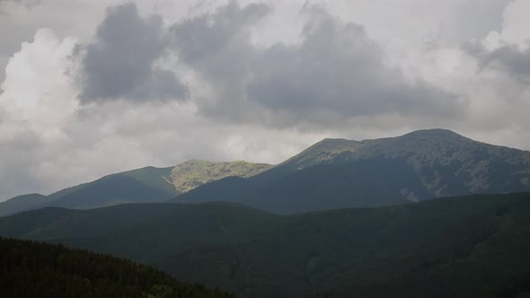 Timelapse Mountain Landscape with Moving Clouds