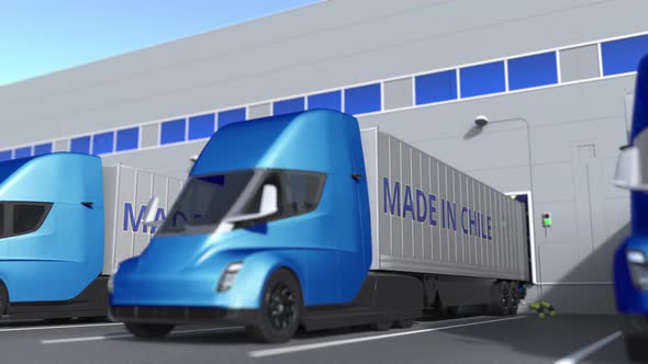 Semi-trailer Trucks with MADE IN CHILE Text at Warehouse