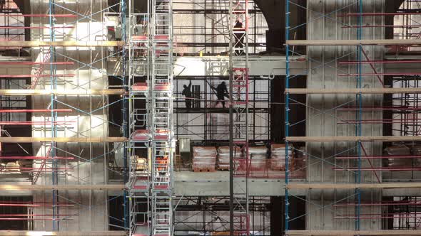 Construction Equipment Material with Scaffolding and Tools Inside the Floor of High Rising Building