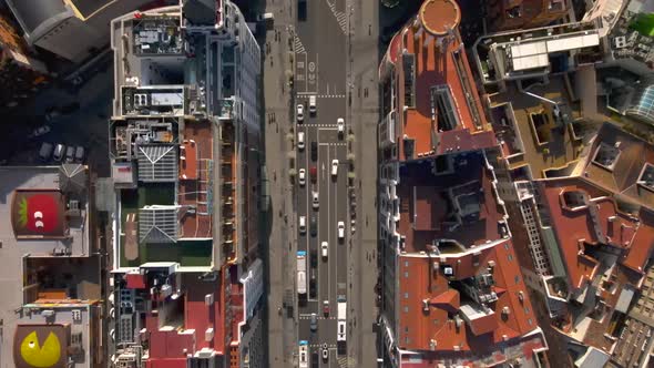Top down view of cars traveling along street in Madrid Spain
