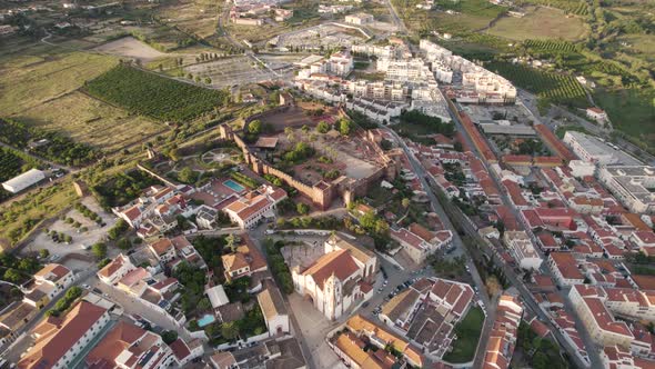 Silves Cathedral, Algarve. Aerial cityscape view of medieval walled Silves city.