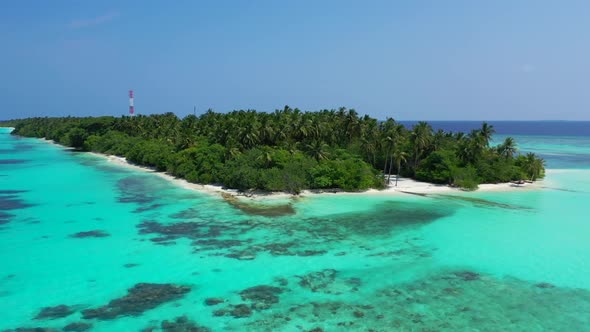 Aerial flying over landscape of exotic island beach holiday by aqua blue sea and white sand backgrou