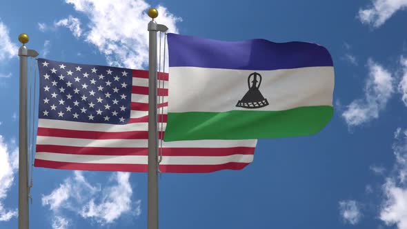Usa Flag Vs Lesotho Flag On Flagpole