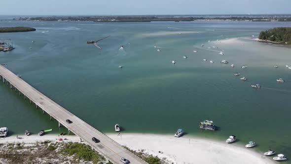 aerial timelapse of Longboat Pass and Jewfish Key in Sarasota, Florida. Well known boat party spot