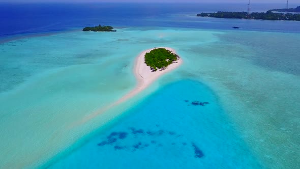 Aerial drone scenery of tropical lagoon beach by lagoon with sand background