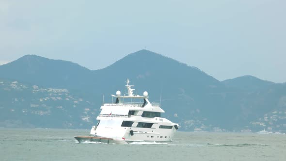 Motor Yacht Near Coast.