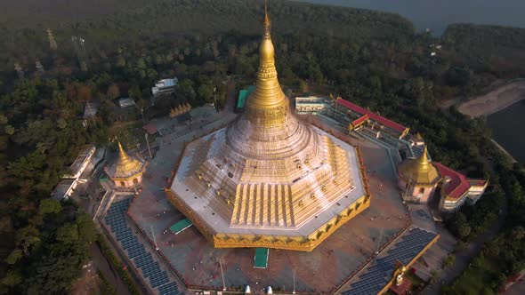 Mumbai, India, "Global Pagoda" temple, 4k aerial drone sunset footage