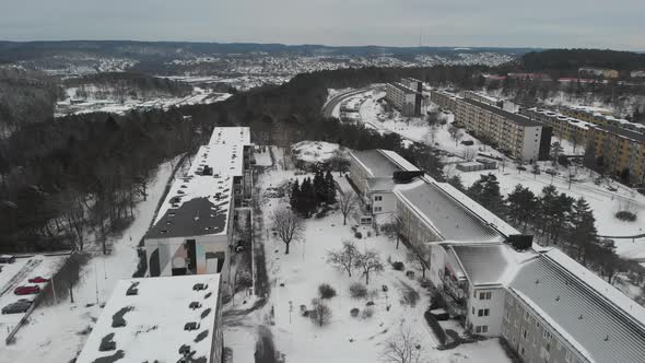 Suburban Apartment Buildings Covered in Snow Rising Aerial
