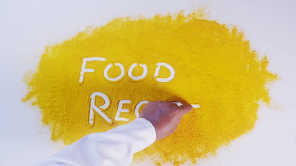 Hand Writes On Turmeric Food Recipe