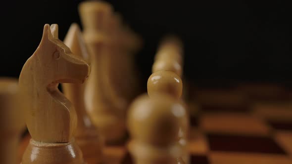 Macro View of White Wooden Chess on Checkerboard