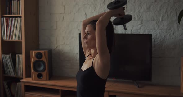 Young Woman Doing Sports and Yoga at Home