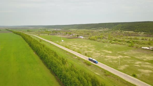 Truck On The Village Road