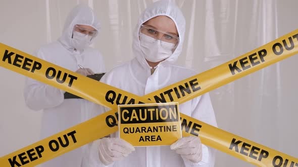 Portrait of Two Doctors in Protective Masks in a Laboratory