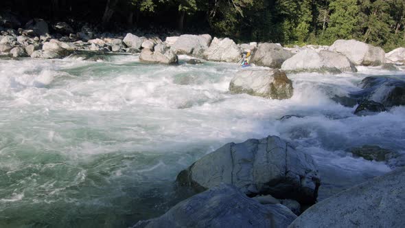 Kayak Adventure Of Man Paddling River Rapids On Sunny Day alt