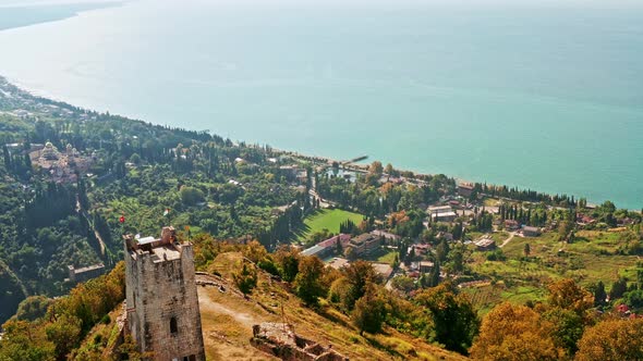 Aerial View of the Old Fortress in Mountains on Sea Coast. Panorama From Height To the Ruins of the