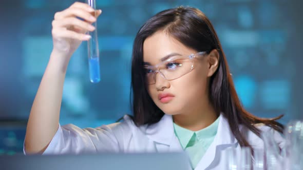 Woman Chemist Conducting Analysis Biotechnology Doing Medical Research Medium Closeup