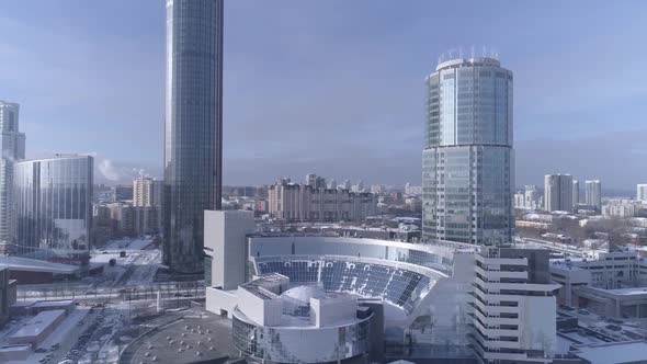 Aerial view of modern glass facade buildings in Ekaterinburg city. Russia, winter, sunny day 09