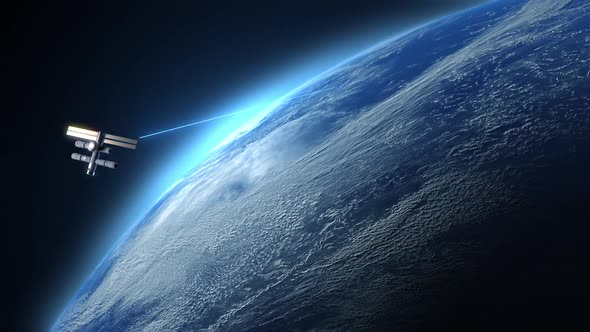a space station in space orbiting the globe emits laser blue beams toward earth alt