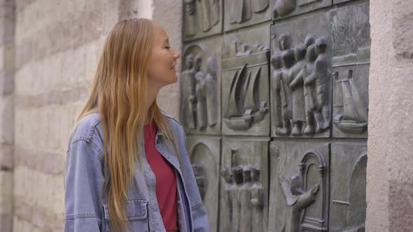 A Young Woman Visits the Old Town of Kotor in Montenegro