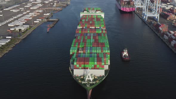 Cargo Ship Loaded With Intermodal Containers Leaving Husky Terminal And Stevedoring At Port Of Tacom