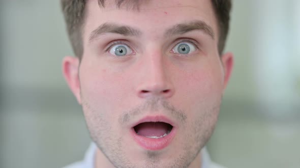 Close Up of Shocked Young Man