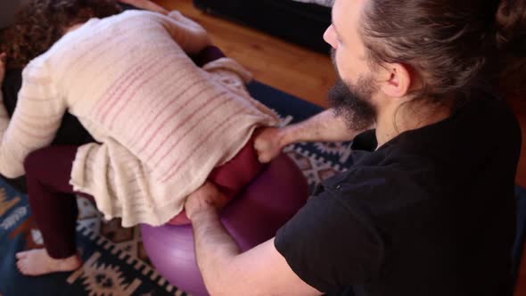 Therapist Gives Lady Lumbar Back Massage