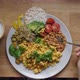 Top View of Woman Eating Vegan Breakfast of Tofu Omelet, Beans and Salad and Drinking Plant Based - VideoHive Item for Sale