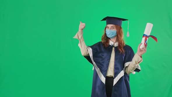 Graduation Distance Young Woman in Gown and Hat Rejoices Receiving Diploma and Shows Class with