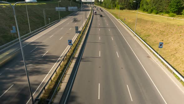 Evening traffic on the highway, tilt time-lapse