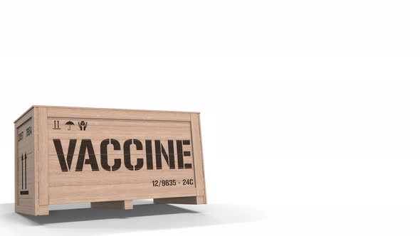 Wooden Crate with a Vaccine on White Background alt