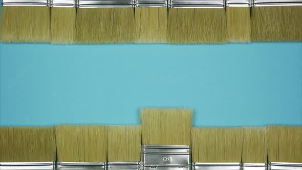 Horizontal Border of Wall Paint Brushes with Text Space. Stop Motion