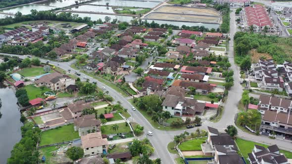 Drone flying around Venice of Perak, featuring wide array of residential buildings in the neighborho