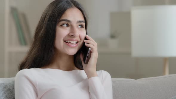 Hispanic Lady Has Mobile Conversation Friendly Chatter at Home Cellular Chatting Talking with Friend