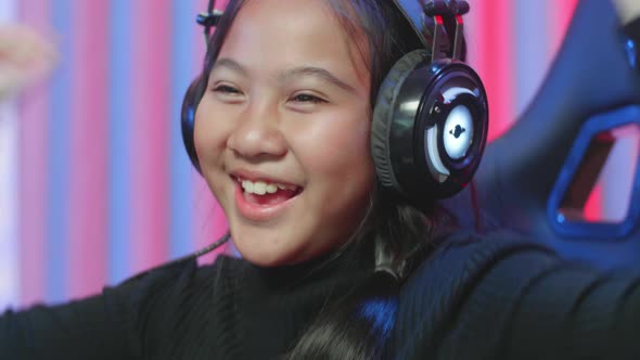 Gamer Girl Headphones Making Winner Playing A Video Game