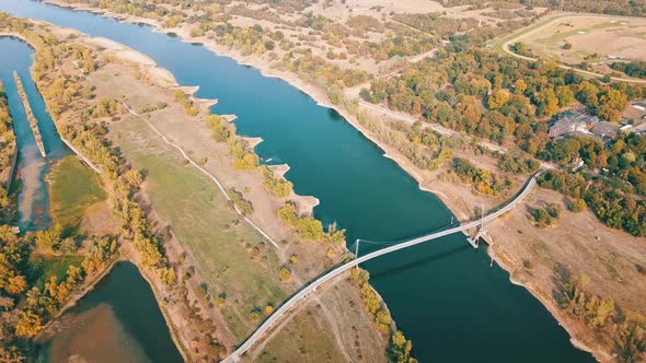 Aerial View Of Herrenkrug Bridge Spanning Elbe River In Magdeburg Germany Drone Pullback (Ascending