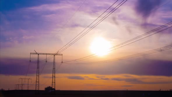 Timelapse of the Sky at Sunset Against the Background of an Electric Pole with Wires