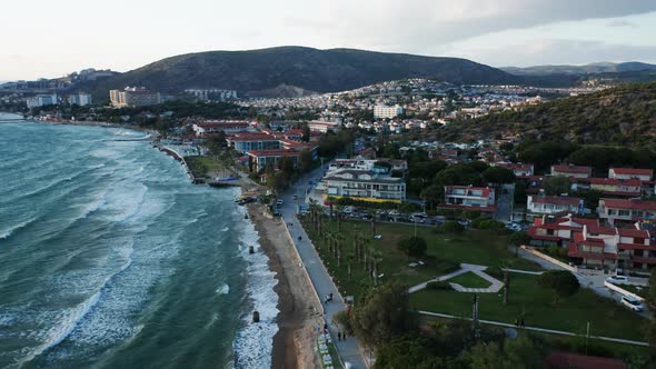 Large resort town of Kuşadası on scenic Turkey coast. Popular holiday destination - aerial of beach