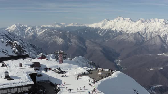 Shooting From Helicopter People Enjoying Leisure at Mountain Peak 2320 at Winter Season