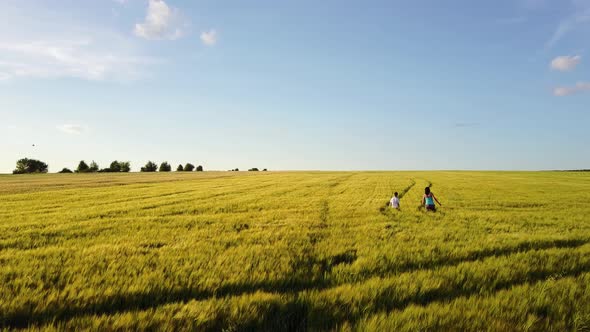 Family Walking Around Field