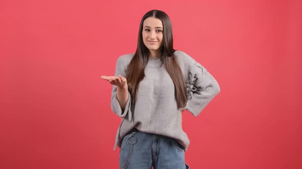 Woman Isolated Over Red Background Unhappy for Not Understand Something