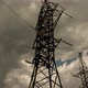 Wide view of clouds passing behind power line pylon in sunset sky background, time lapse - VideoHive Item for Sale