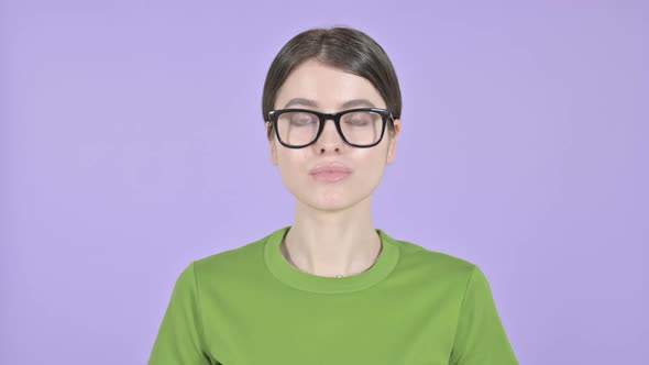 Young Woman Looking at Camera on Pink Background