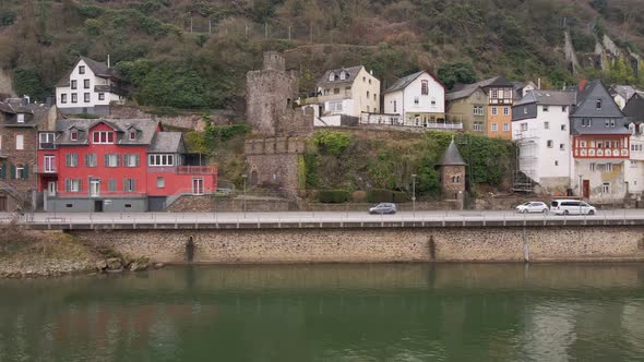 gliding drone flight from cochem on the banks of the river Moselle and the facades of the beautiful