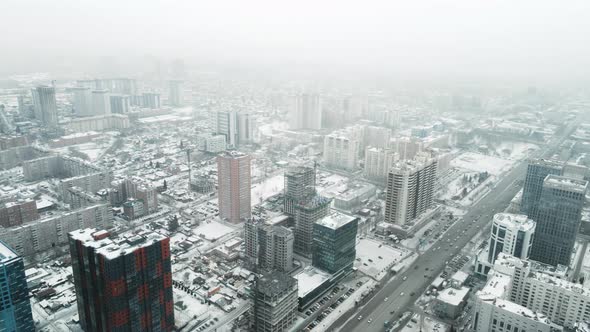 Aerial Photography of a Winter City in a Blizzard