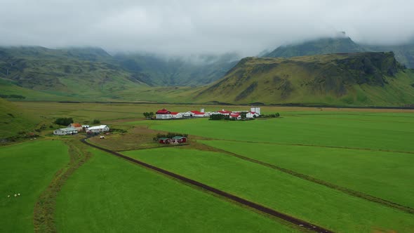 Flying Over Typical Icelandic Farms in the Green Mysterious Valley