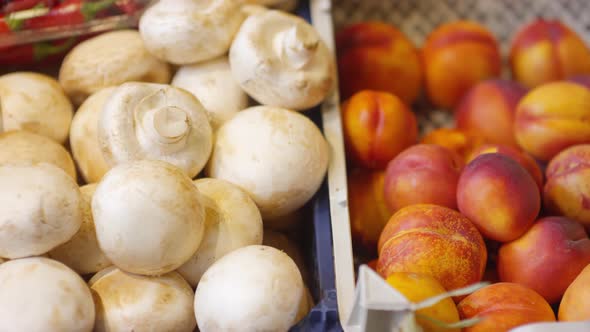 Fresh Fruit and Mushrooms in Food Market